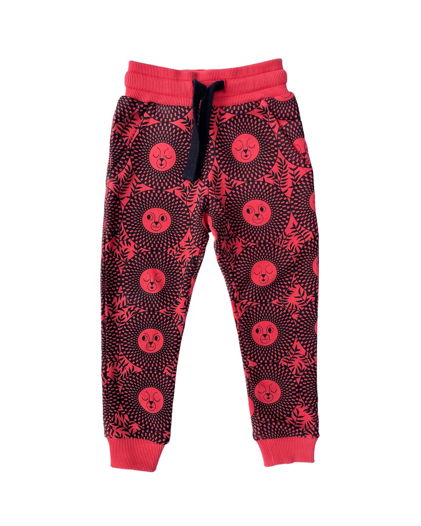 red / black African inspired lion face joggers